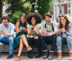 a group of individuals using gadgets