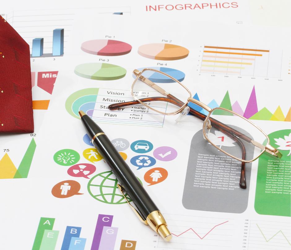 a pen and eyeglasses with an infographics background