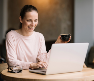 a freelancer holding a cup of coffee